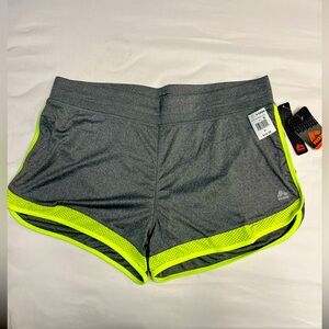 Woman’s new with tags, RBX quick dri shorts,
Gray with lime green edge